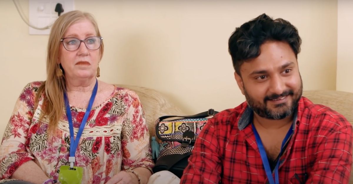 Jenny and Sumit sitting next to each other on a couch in 90 Day Fiance: The Other Way.