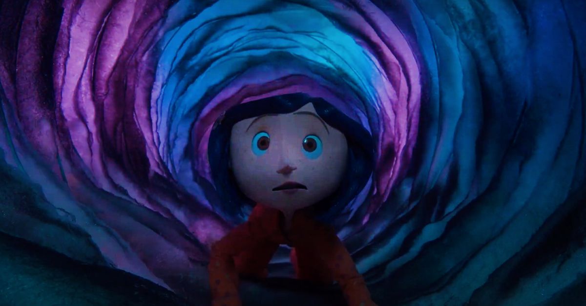 Coraline going through a purple and blue tunnel in the movie, Coraline.