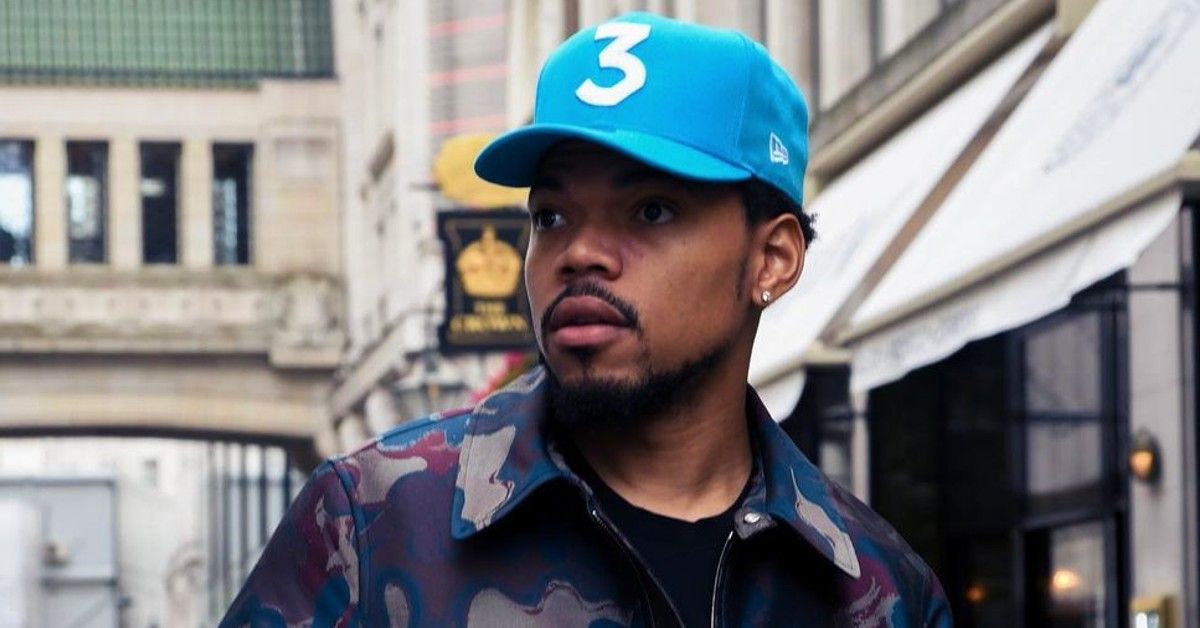 Chance the Rapper in a blue hat