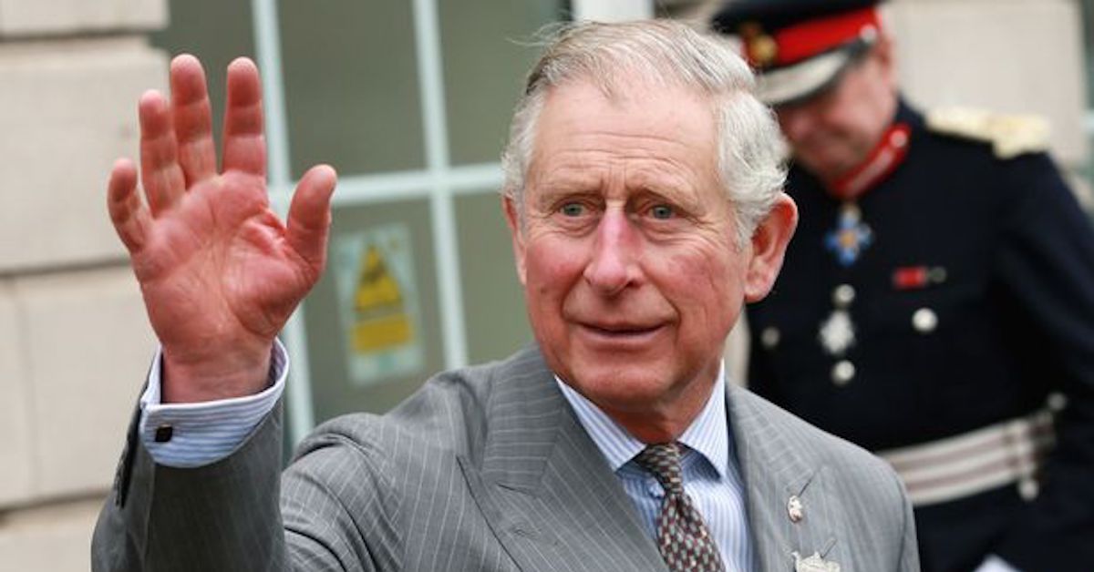 Prince Charles waves. 