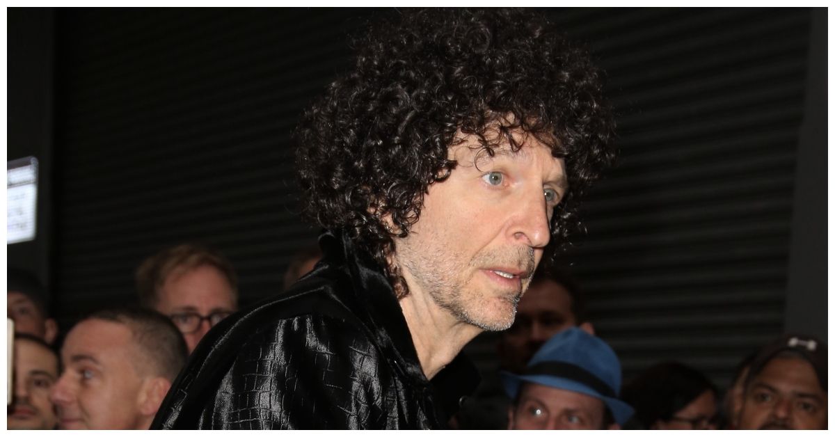Howard Stern surprised by paparazzi with fans