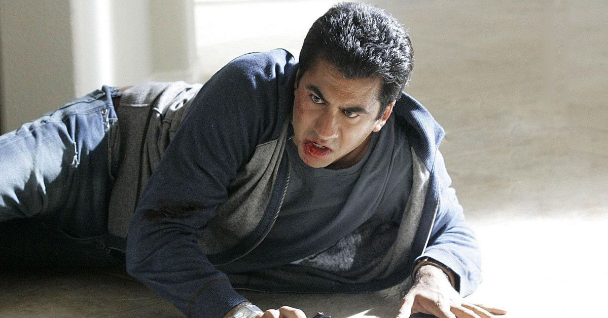 Kal Penn lies on the ground, hurt, in '24'