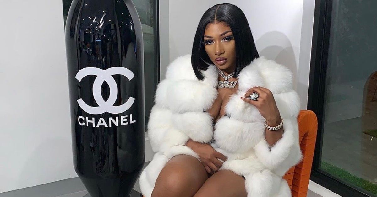 Megan Thee Stallion looking hot in white coat and Chanel