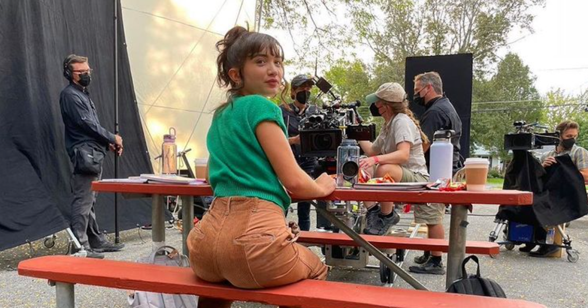 Rowan Blanchard turns to face a camera while on set
