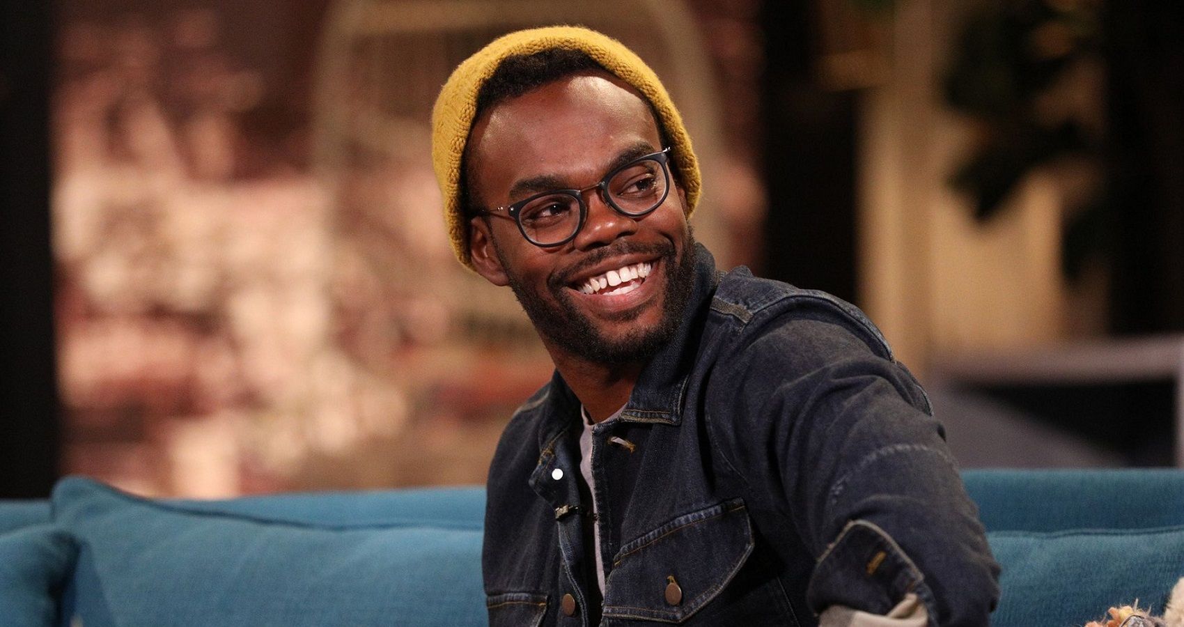 William Jackson Harper Smiling during an interview