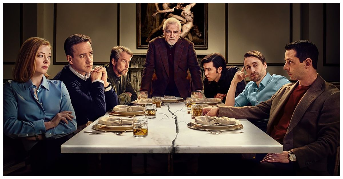 the cast of Succession sitting around a broken dinner table logan roy hbo kendall roman shiv