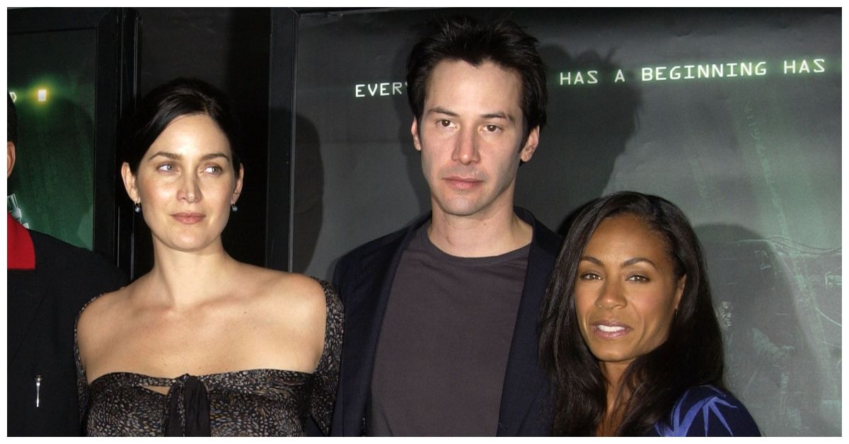 Carrie-Anne Moss side-eyeing Keanu Reeves and Jada Pinkett-Smith at Matrix Revolutions Premiere