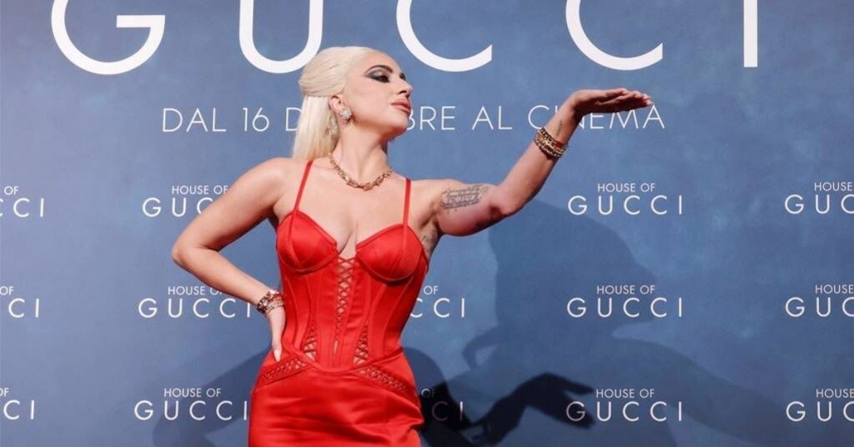 Lady Gaga strikes a pose on the red carpet for the Milan film release of House of Gucci