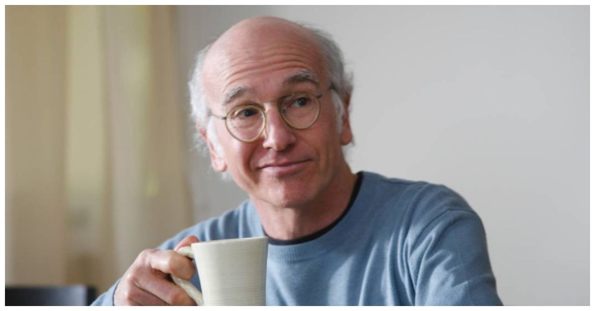 Larry David drinking coffee in Curb Your Enthusiasm looking really happy 