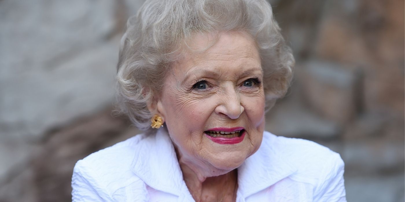 the late Betty White smiling and looking at the camera
