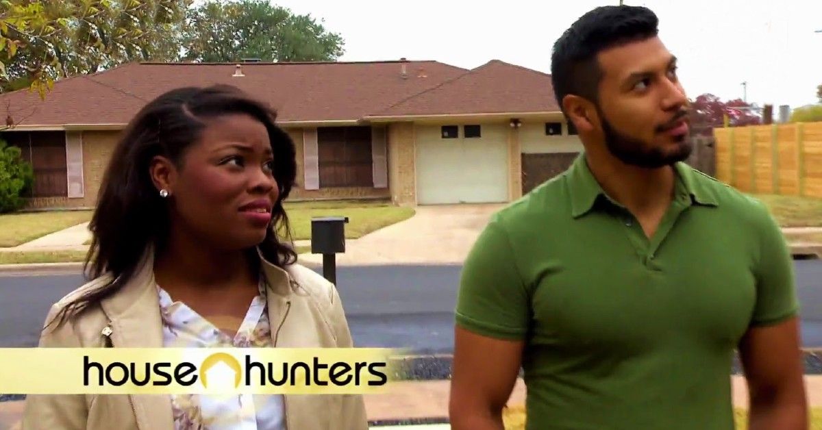 Couple featured on House Hunters stand outside