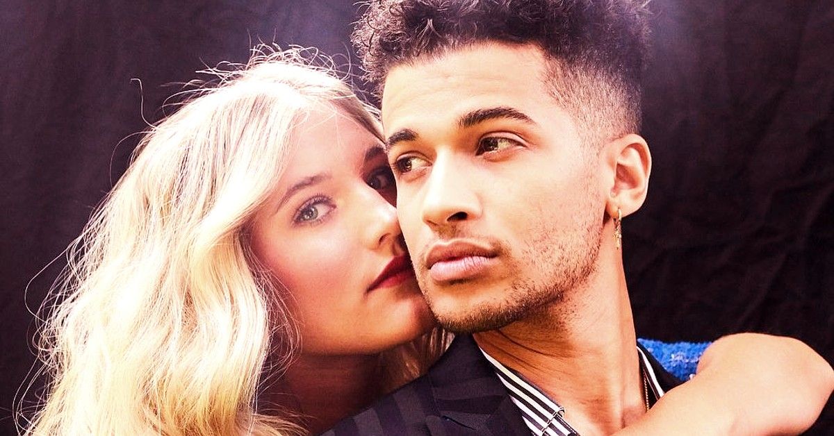Jordan Fisher posed face to face with wife Ellie Woods