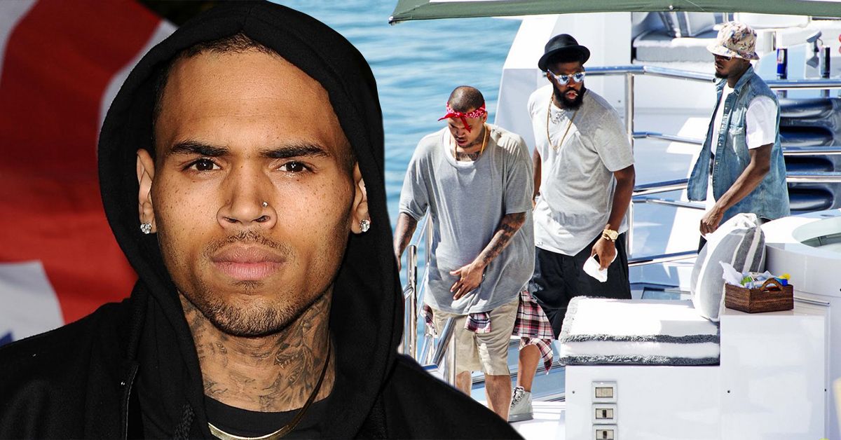 Chris Brown on a yacht in a grey shirt