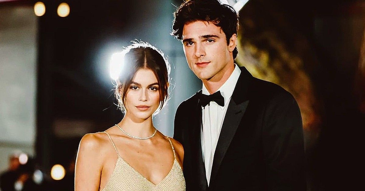Jacob Elordi And Kaia Gerber pose together at a red carpet event.