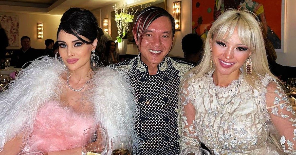 Stephen Hung sitting with wife, Deborah Valdez-Hung and friend dressed up at restaurant
