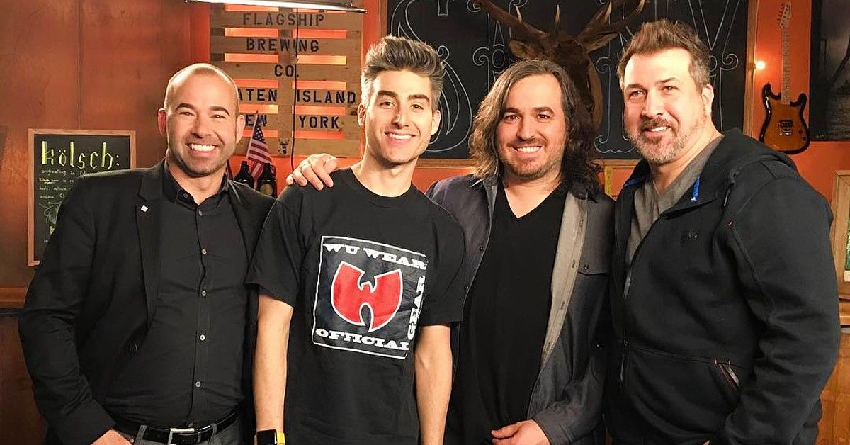 James Murray, Casey Jost, Brian Quinn and Joey Fatone pose together