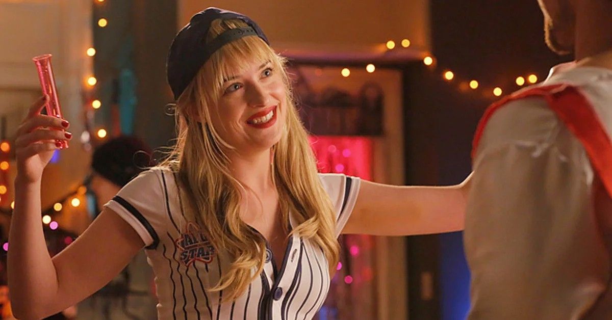 Dakota Johnson in baseball outfit with blonde hair for scene in Ben and Kate