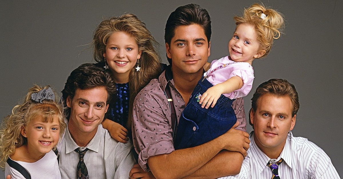 Full House cast John Stamos, Bob Saget, Dave Coulier, Candace Cameron Bure, Jodie Sweetin, and Mary-Kate and Ashley Olsen