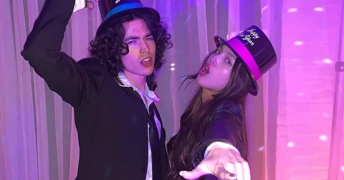Olivia Rodrigo and Conan Gray wearing top hats for New Year's Eve