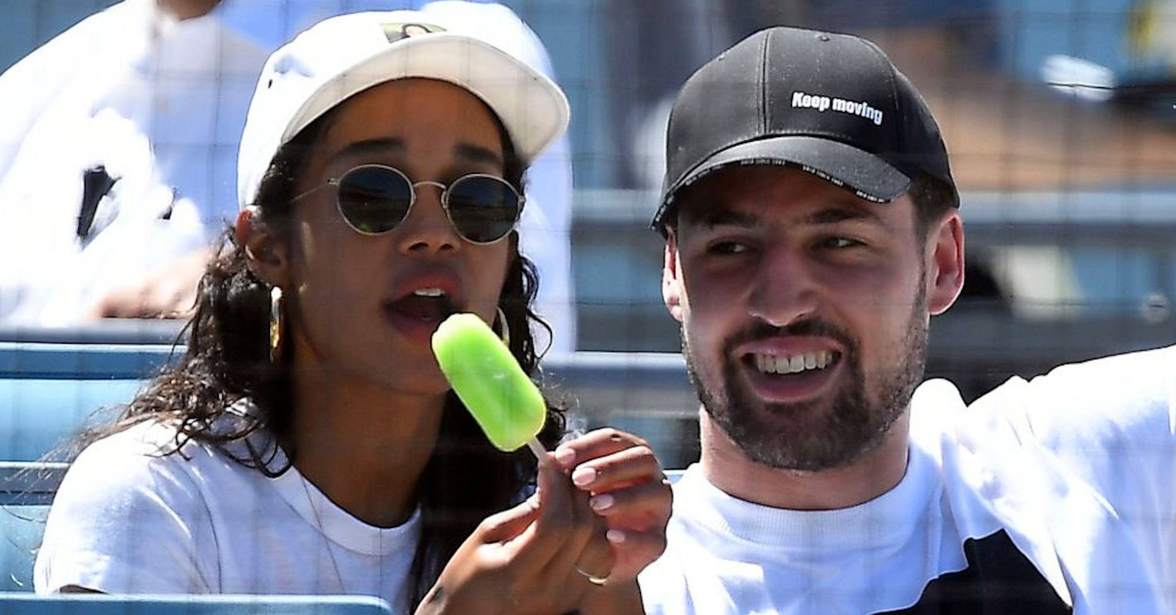 Klay Thompson #11 of the Golden State Warriors and actress Laura Harrier attend the Los Angeles Dodgers and Miami Marlins baseball game