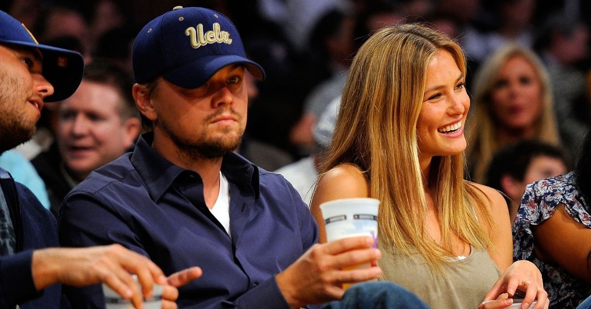 Actor Leonardo DiCaprio and girlfriend model Bar Refaeli sit courtside during Game Two of the Western Conference Quarterfinals of the 2010 NBA Playoffs between the Los Angeles Lakers and the Oklahoma City Thunder at Staples Center on April 27, 2010 in Los Angeles, California.