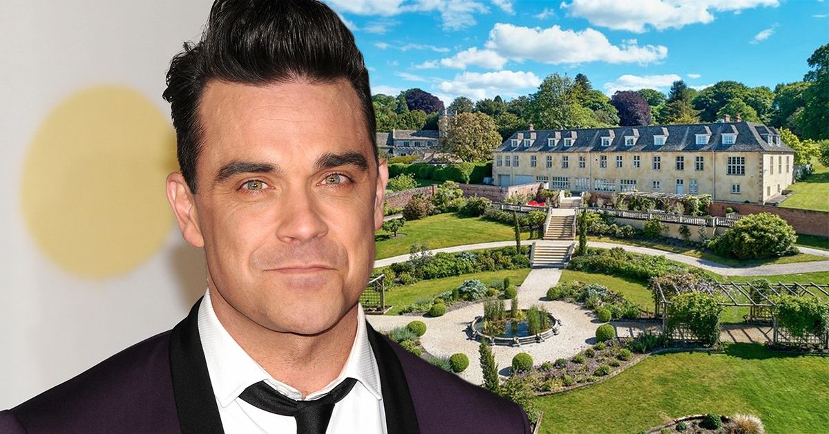 Robbie Williams smirking in a dark suit and thin tie (front), Robbie Williams's now sold mansion (back)