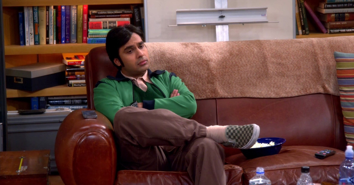 A photo of Kunal Nayyar on Big Bang Theory as his Raj character sitting on the couch