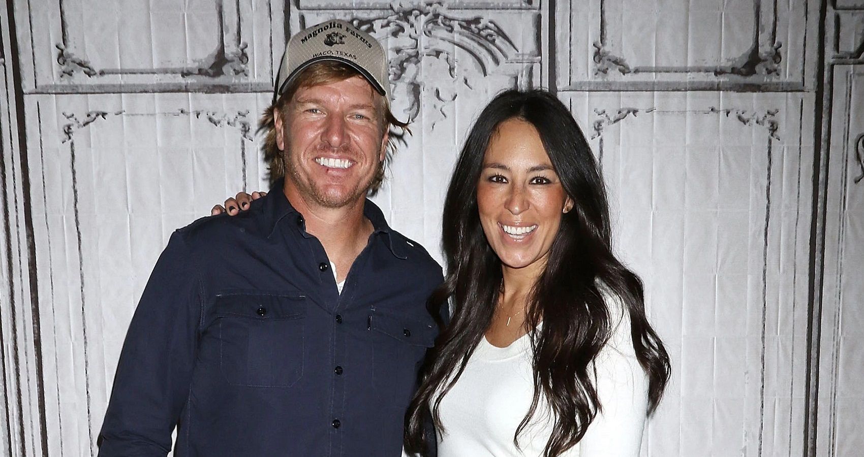 Chip And Joanna Gaines in front of an antique style background