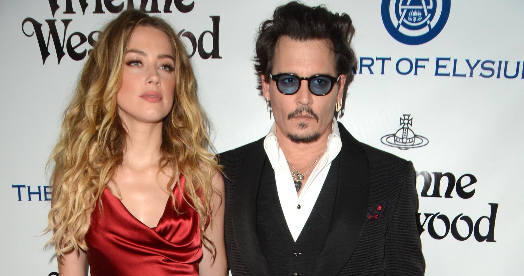 Johnny Depp and Amber Heard At An Event