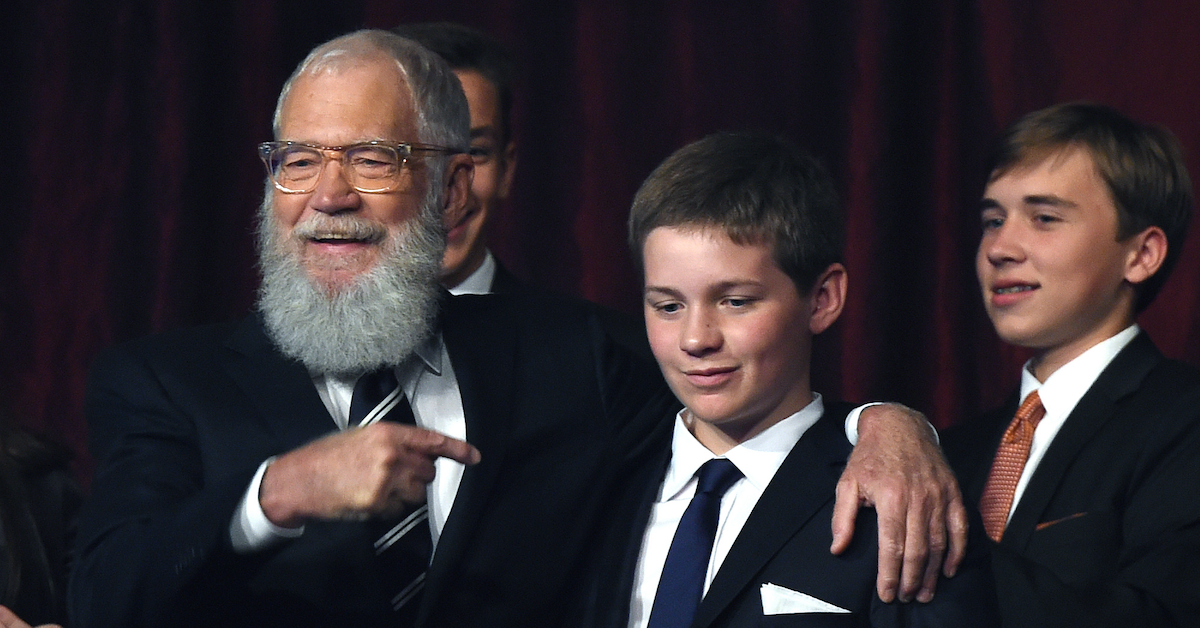 Honoree David Letterman (C), with wife Regina Lasko, greets his son Harry during the show at the 20th Annual Mark Twain Prize for American Humor at the Kennedy Center in Washington, DC, on October 22, 2017.