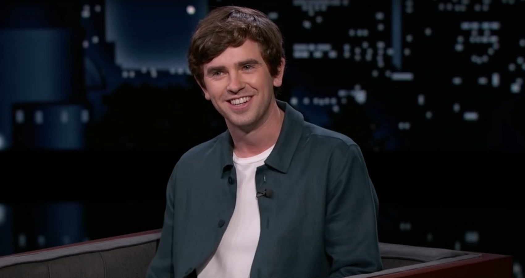Freddie Highmore smiling on the set of Jimmy Kimmel Live