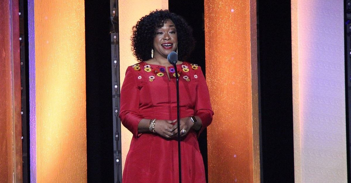 Shonda Rhimes delivers a speech onstage 