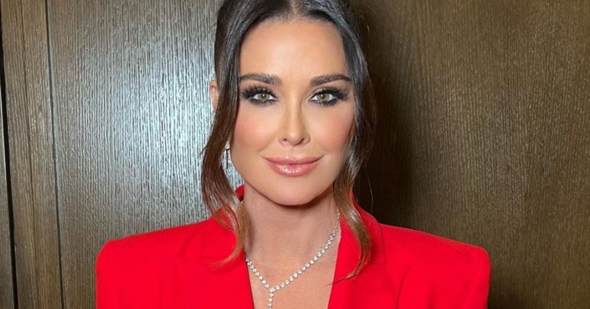 Kyle Richards wearing a red suit