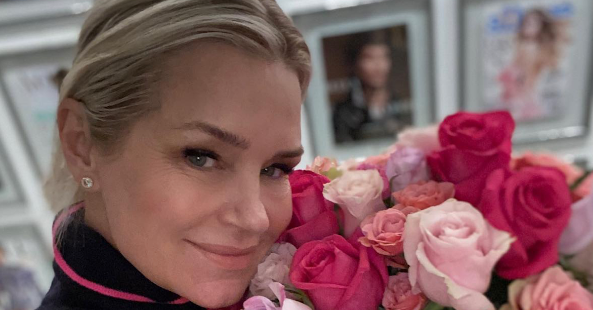 Yolanda Hadid poses with flowers