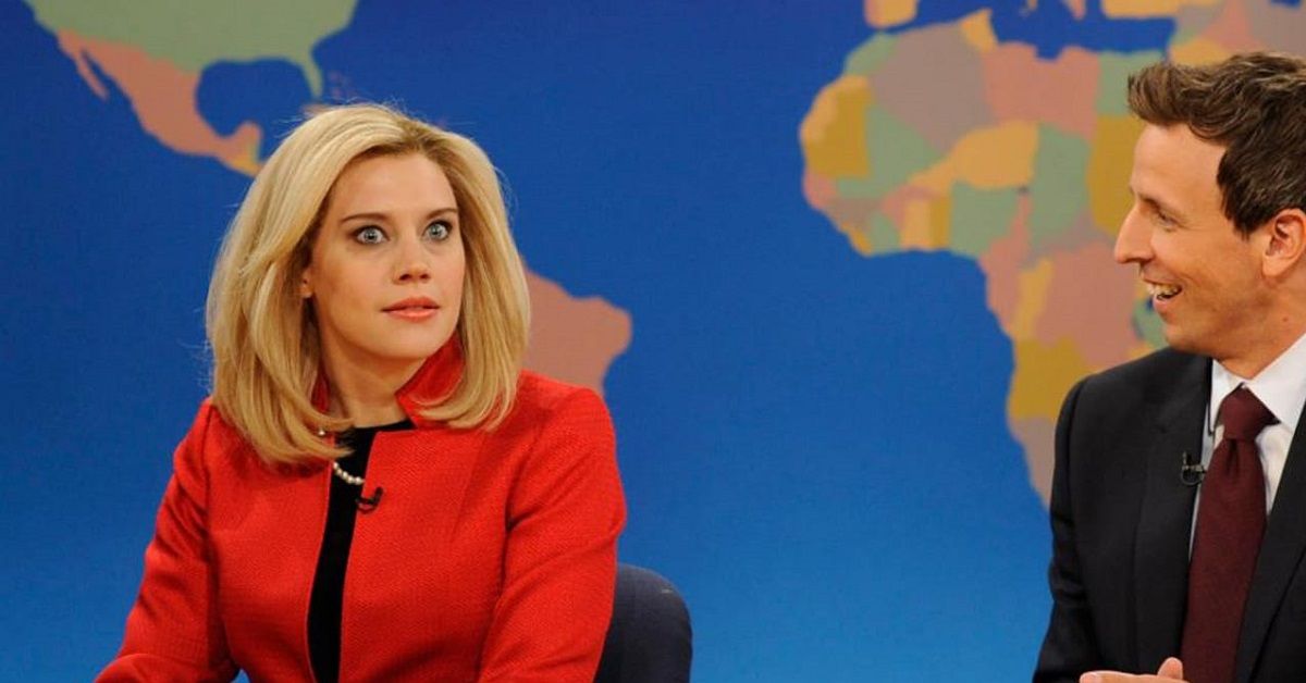 Kate McKinnon looking shocked with Seth Meyers on Weekend Update