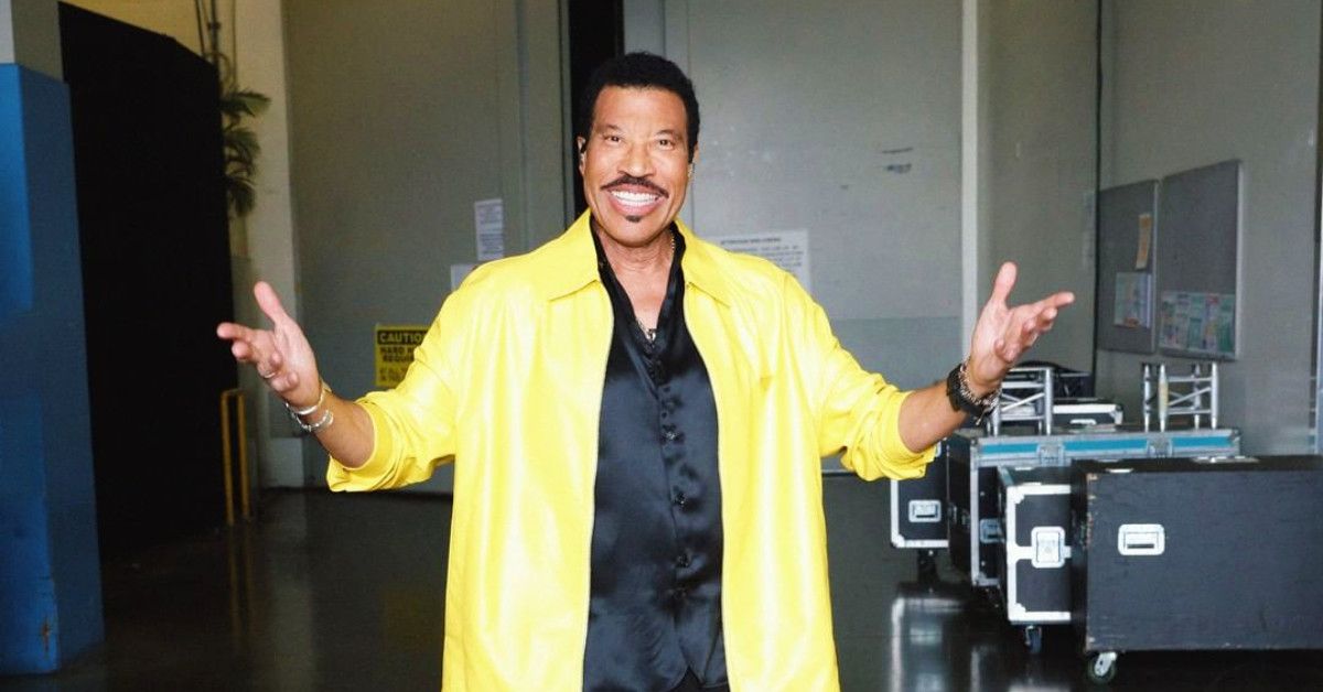 Lionel Richie wearing a yellow jacket