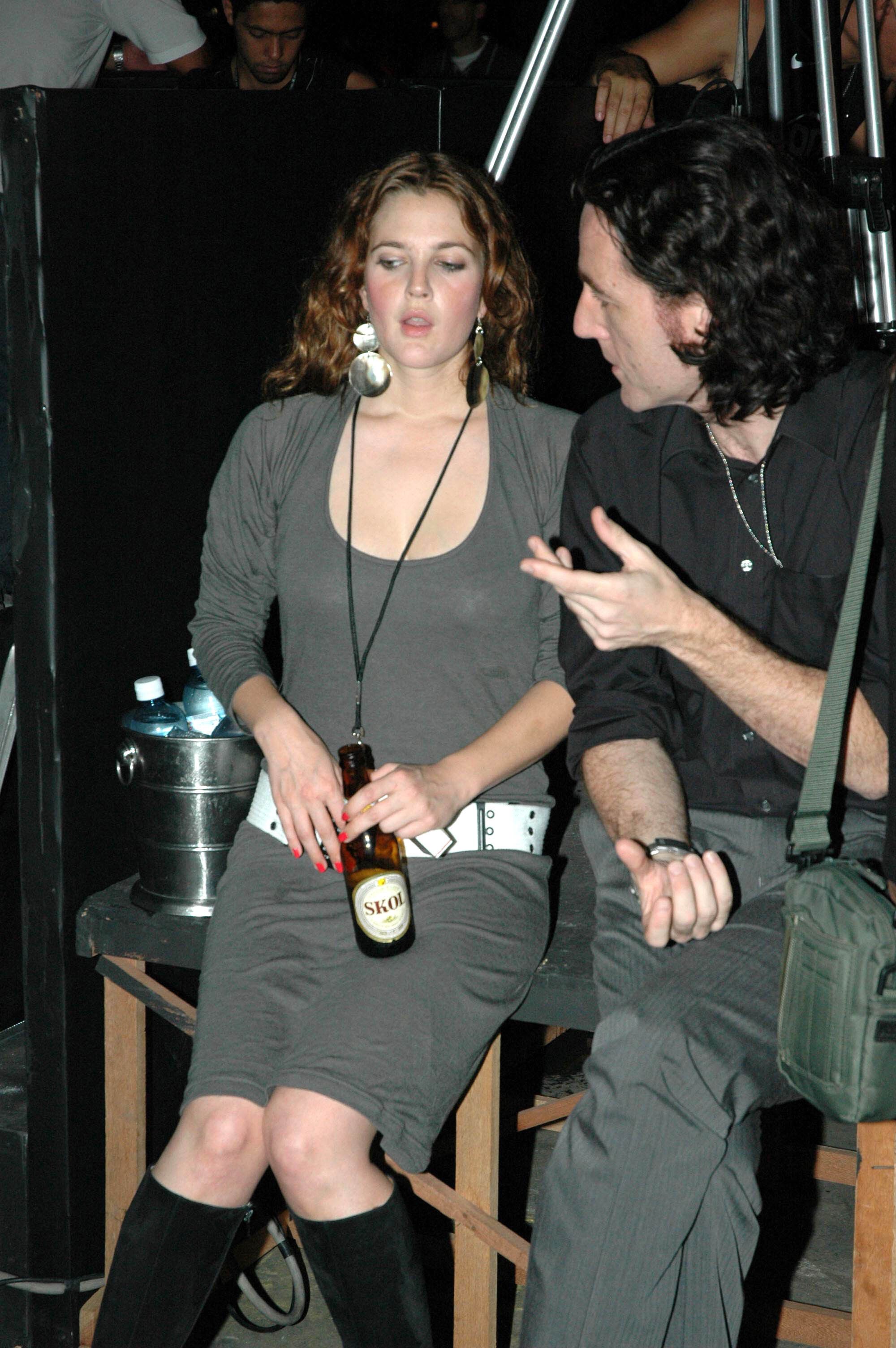 Drew Barrymore at a Strokes performance in 2005