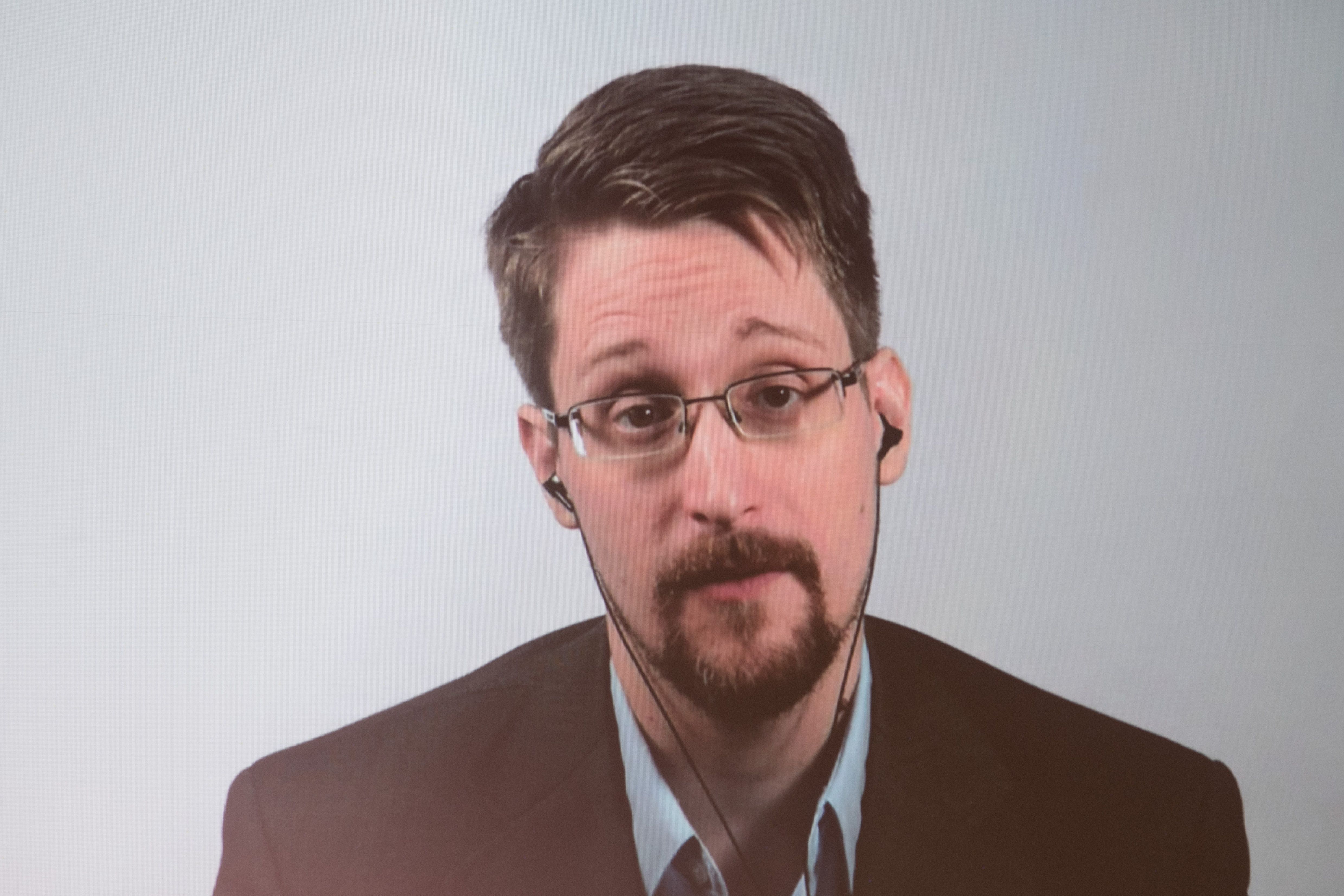 Edward Snowden In A Brown Suit