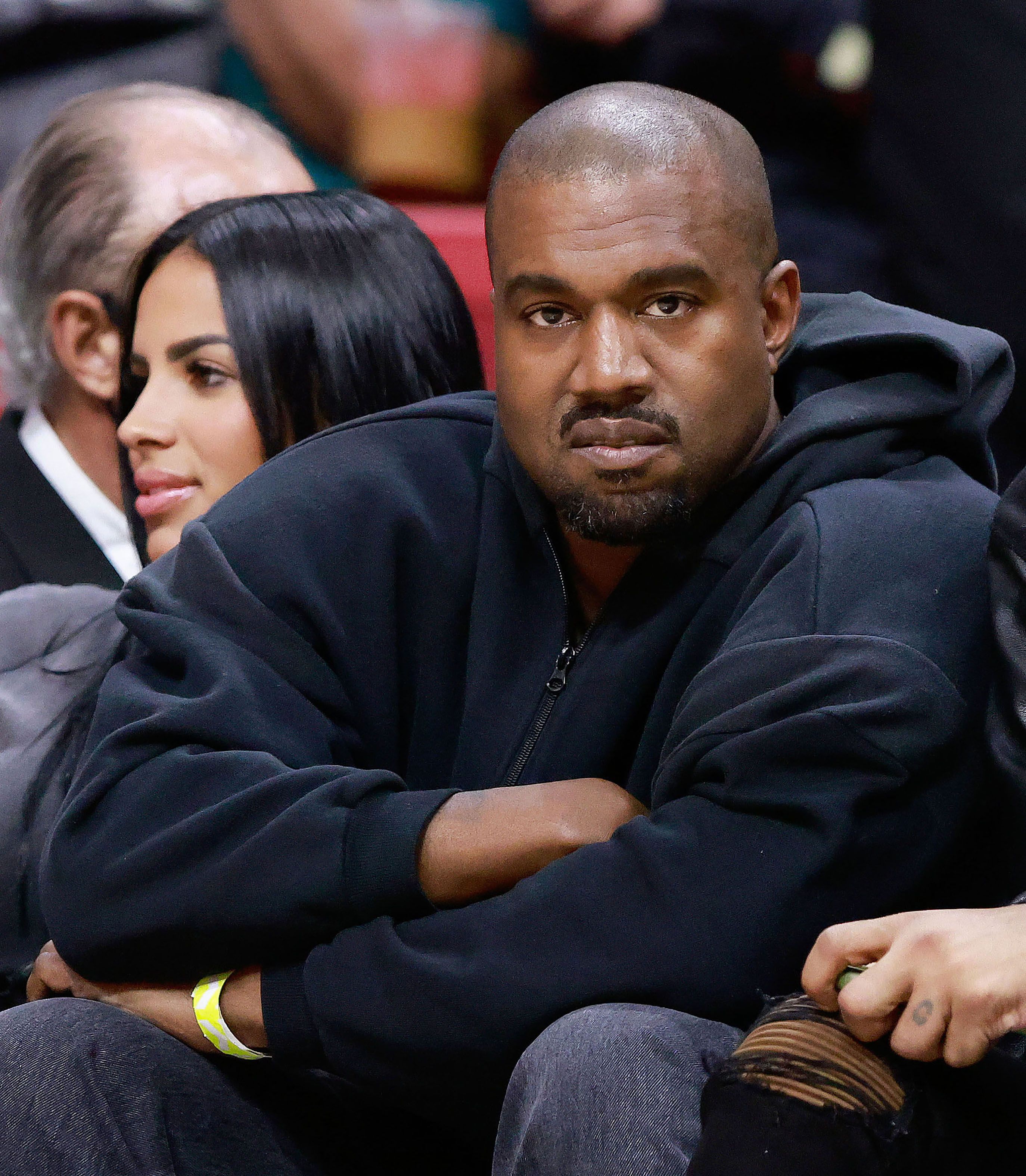 Kanye West watching a Miami Heat vs Minnesota Timberwolves game in March 2022