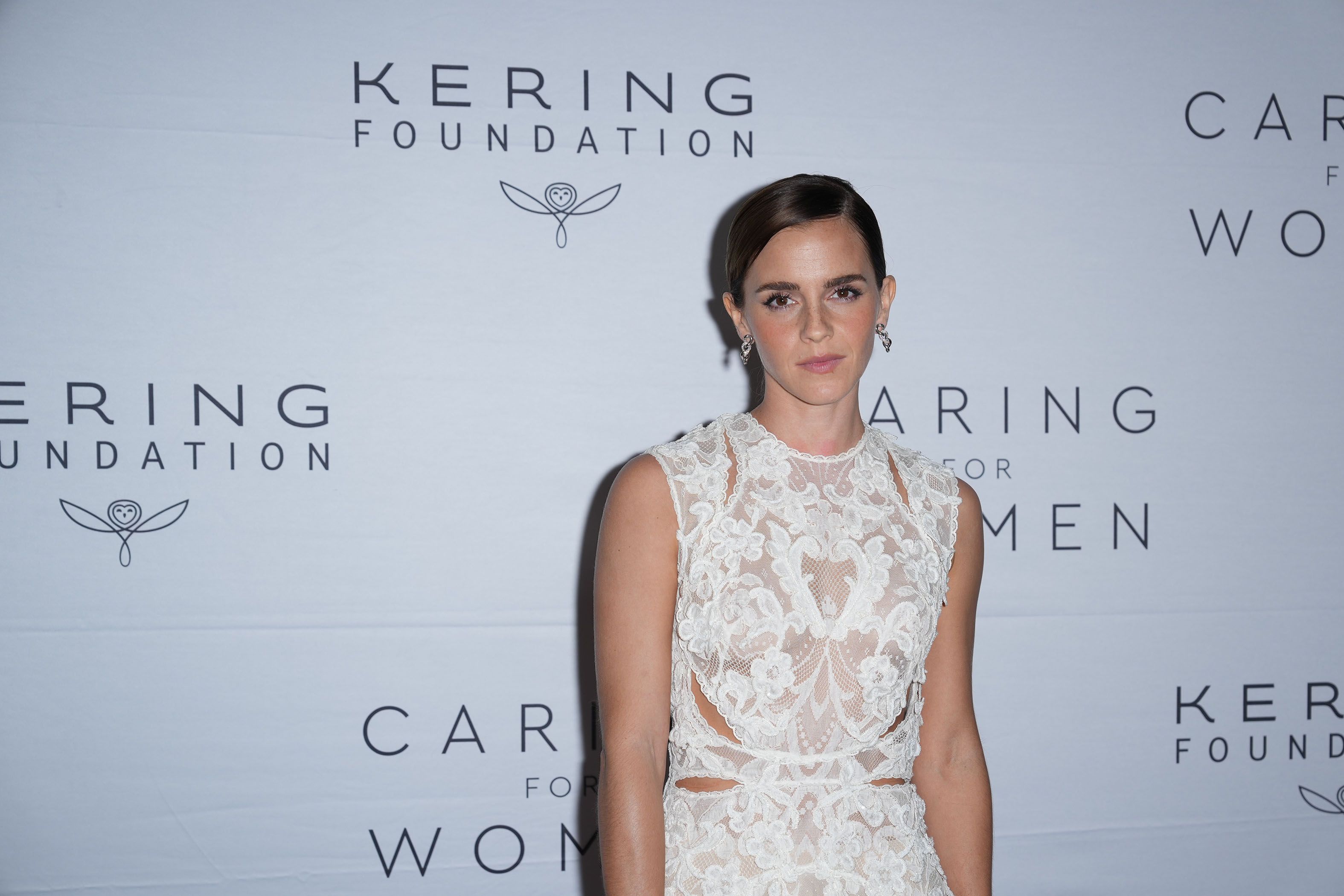 Emma Watson on Red Carpet wearing white dress