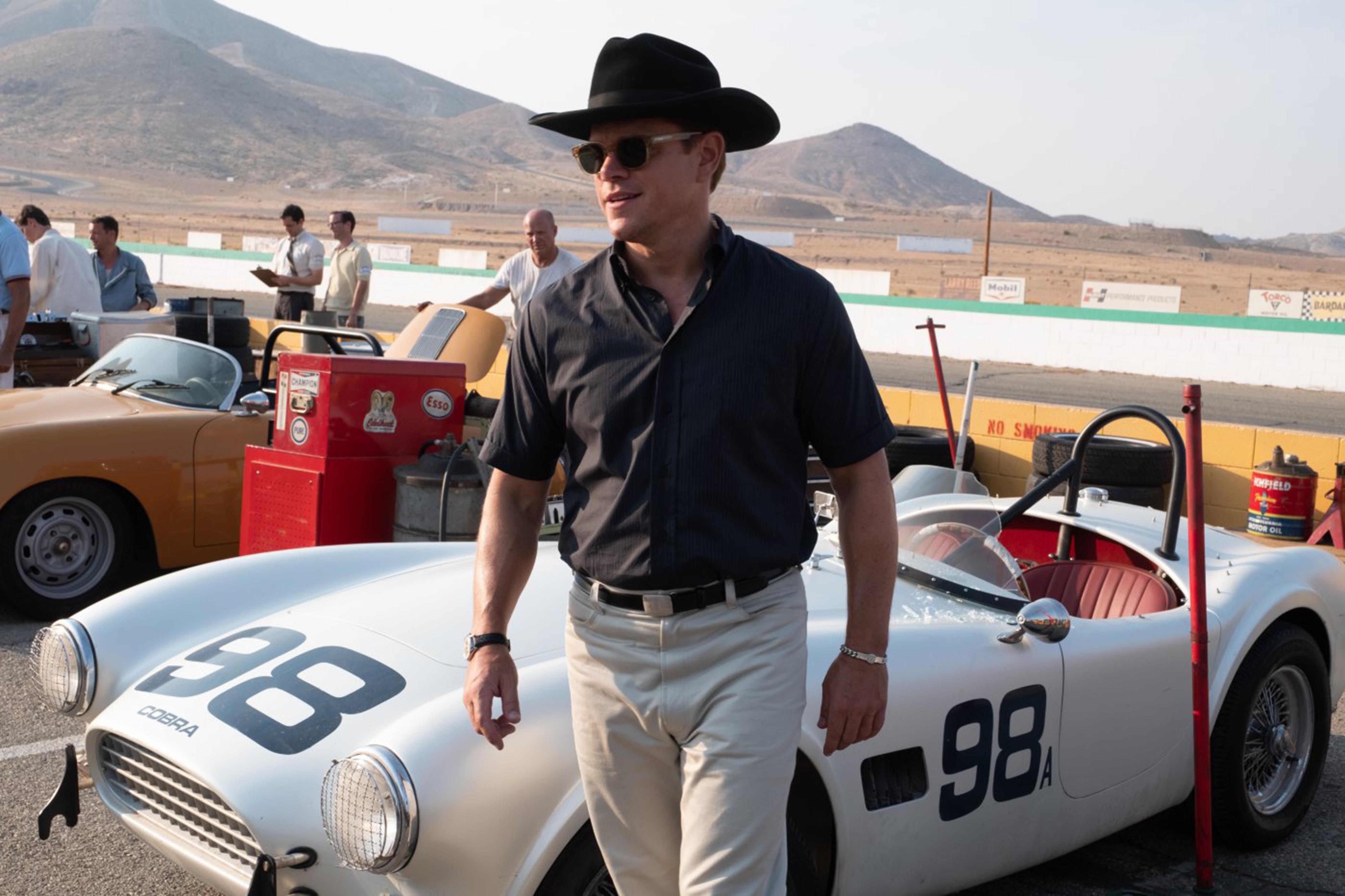 Matt Damon With A Ferrari On The Background