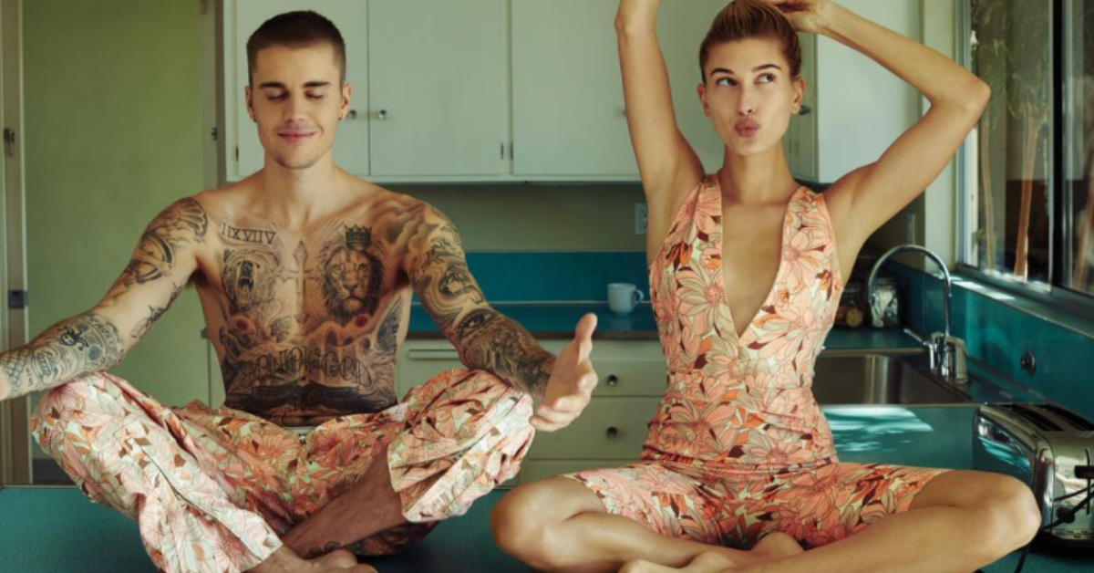 Justin and Hailey Bieber sitting in a pose