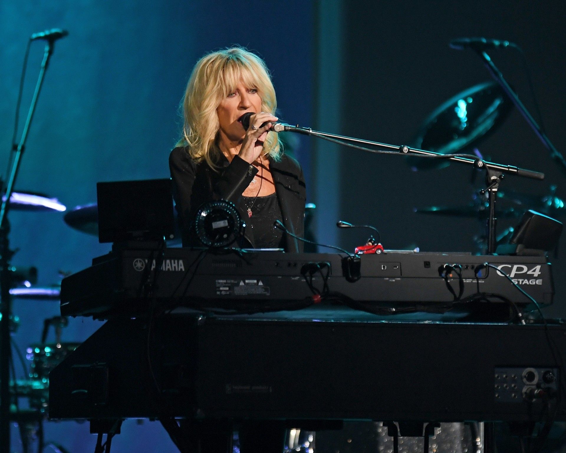 Christine McVie playing piano