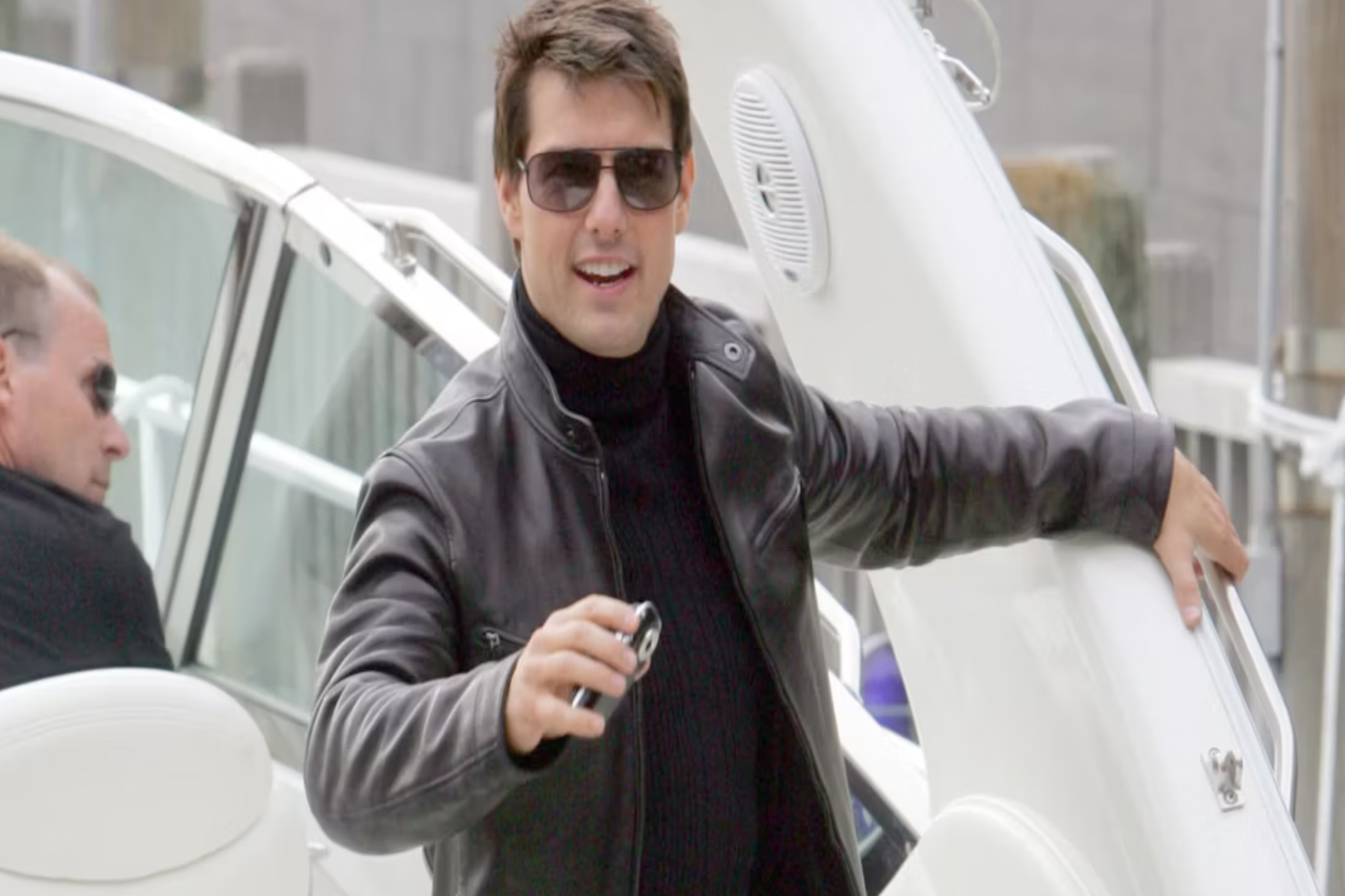 Tom Cruise getting off a boat