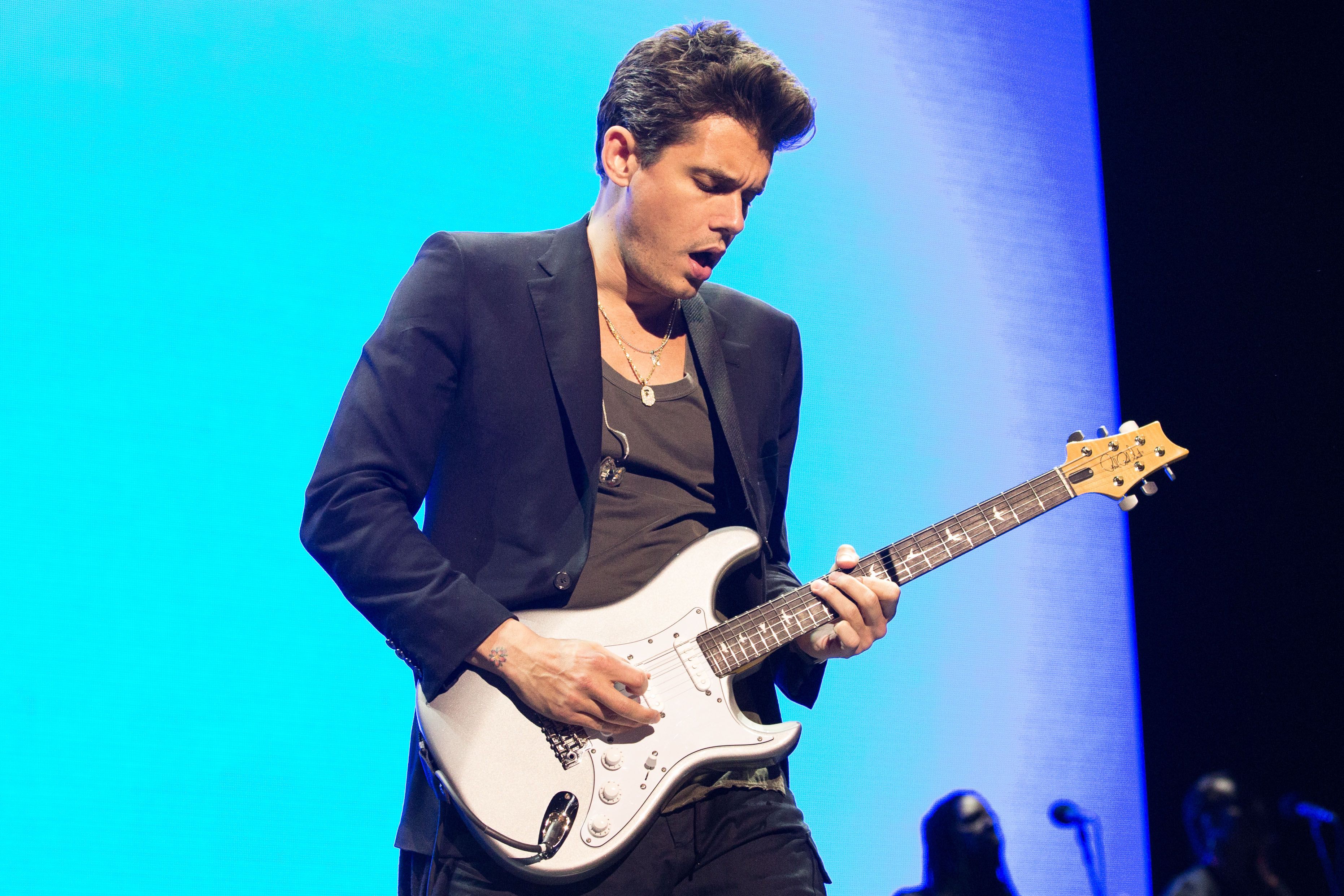 John Mayer performing.jpeg