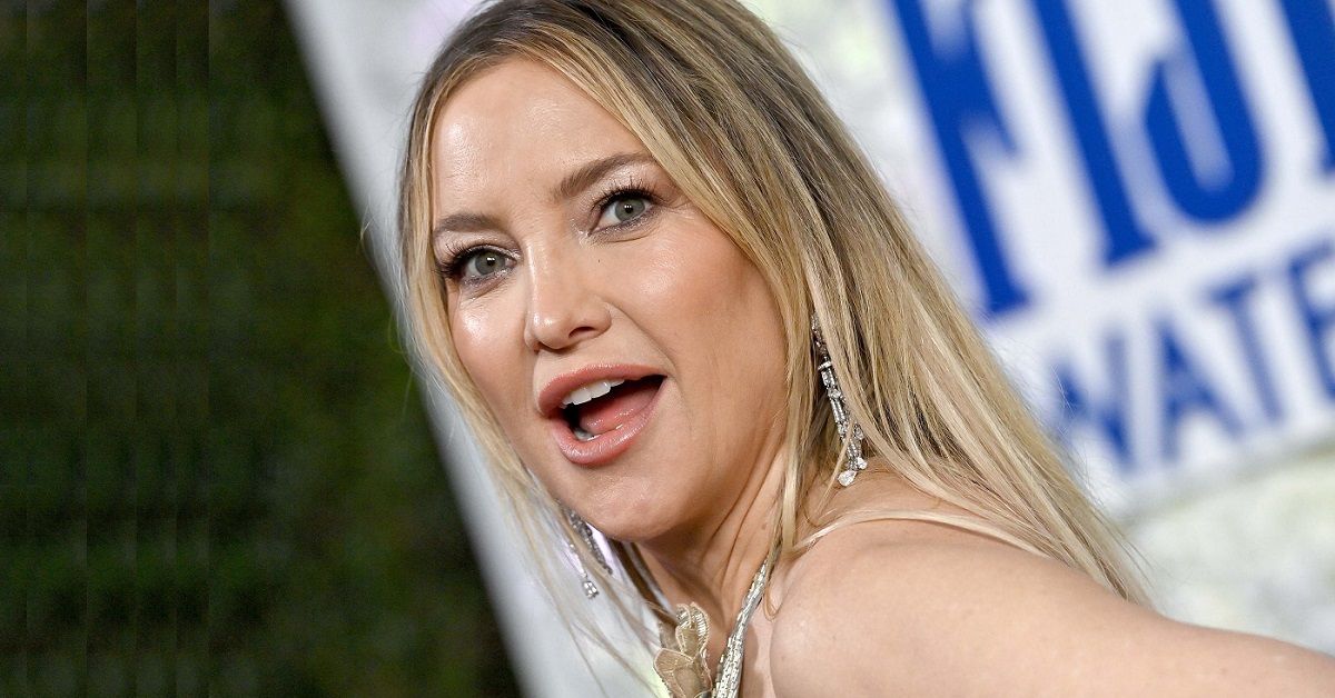  Kate Hudson looking surprised on a red carpet