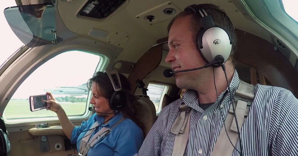 John-David Duggar flying a plane with his mom Michelle Duggar
