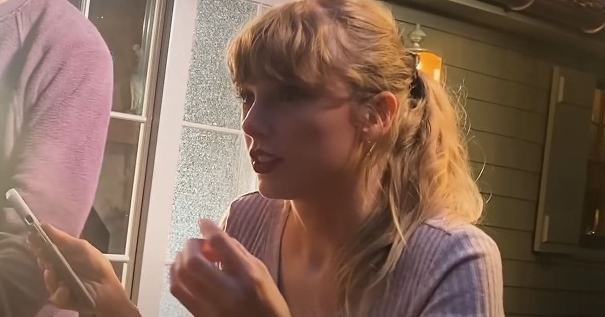 Taylor Swift appears in a behind the scenes video for All Too Well: The Short Film