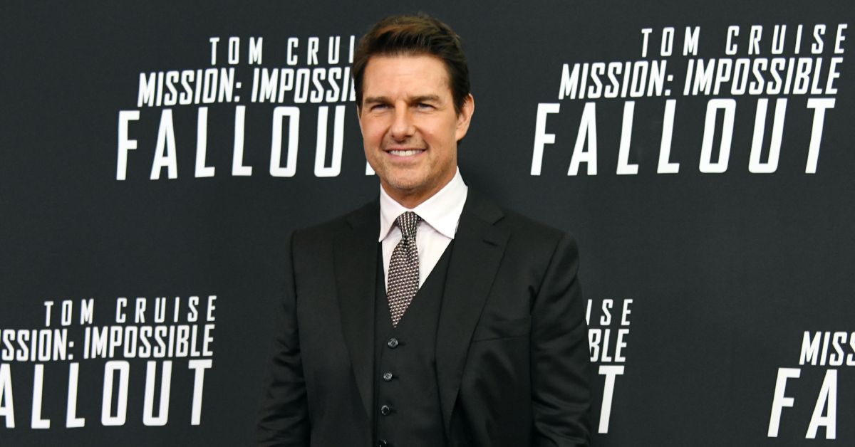 Tom Cruise smiling on the red carpet