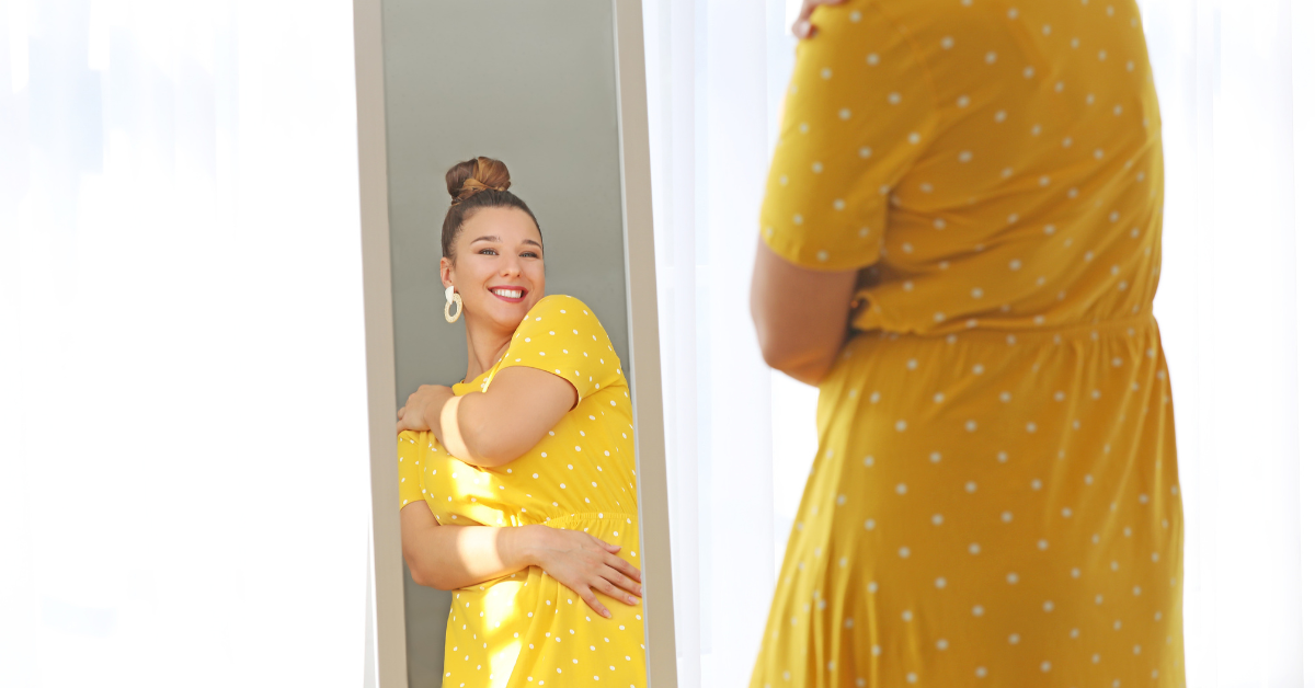 A hugging yellow polka dot dress
